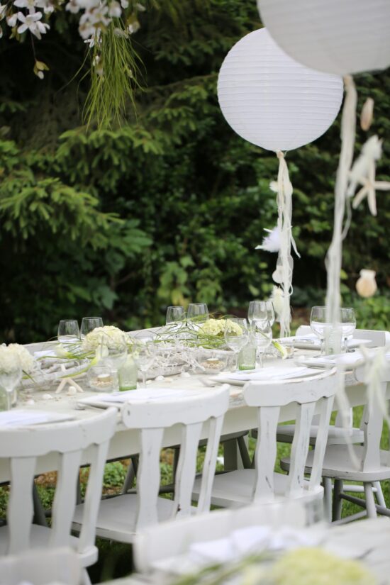 all white table and setting outdoors