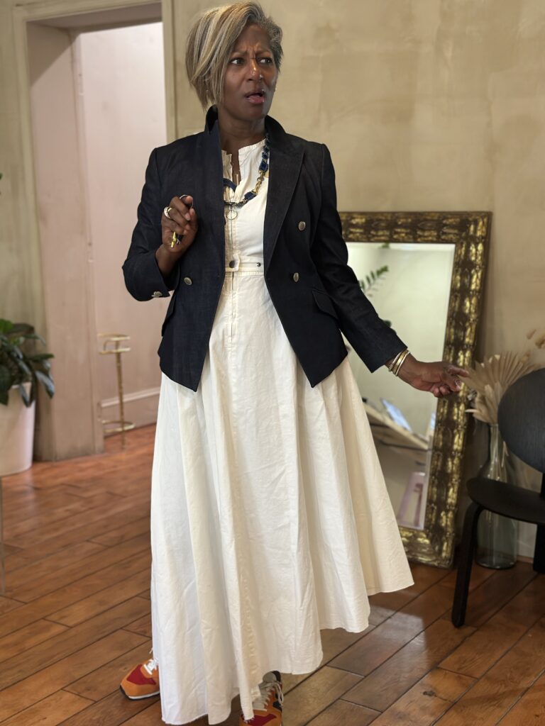 Black woman in a white dress