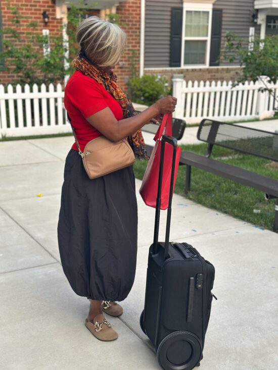 Black woman with luggage